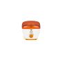 Tilted top view of GiGi Honee Wax Warmer with its wax well showing through its orange lid thumbnail